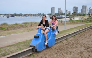 Girls on pedal power bikes