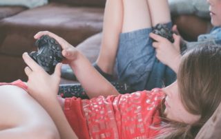 Kids on Couch playing video games