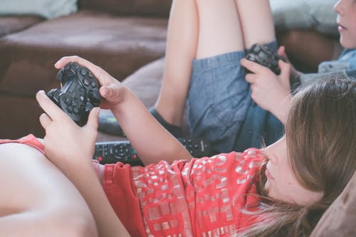 Kids on Couch playing video games